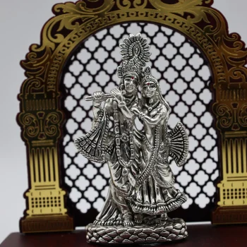 Pure Silver Radha–Krishna Idol with Ornate Arch Frame