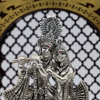 Pure Silver Radha–Krishna Idol with Ornate Arch Frame